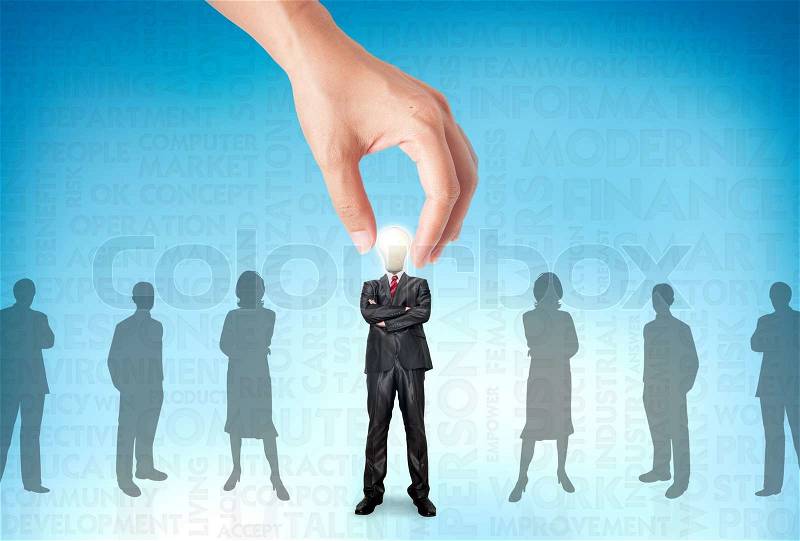 Hand pick Business man stand in front of the others, teamwork, stock photo