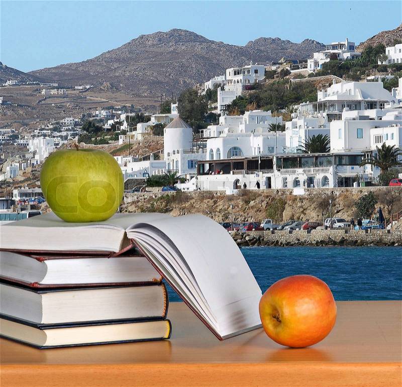Books with apples, stock photo