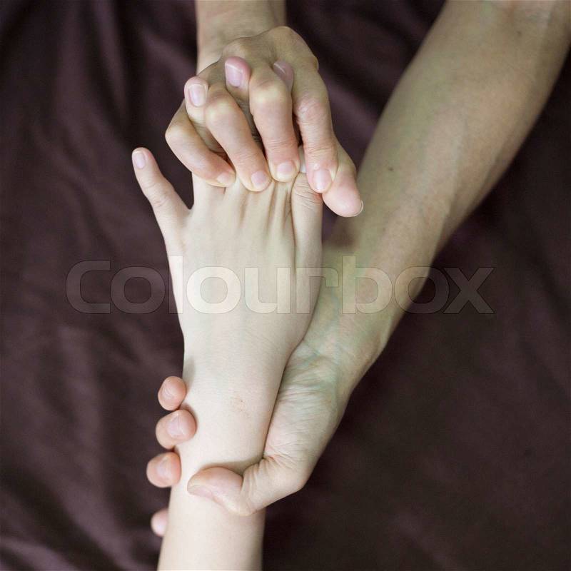 Hand Thai massage in the day spa, stock photo