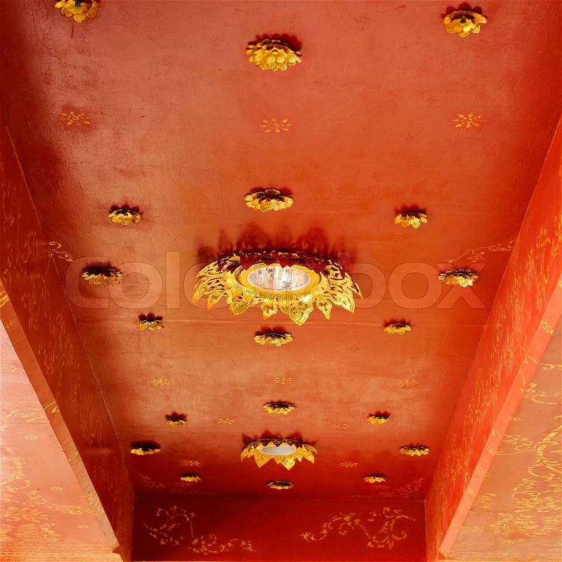 Golden on red thai, Buddha temple ceiling decoration, stock photo