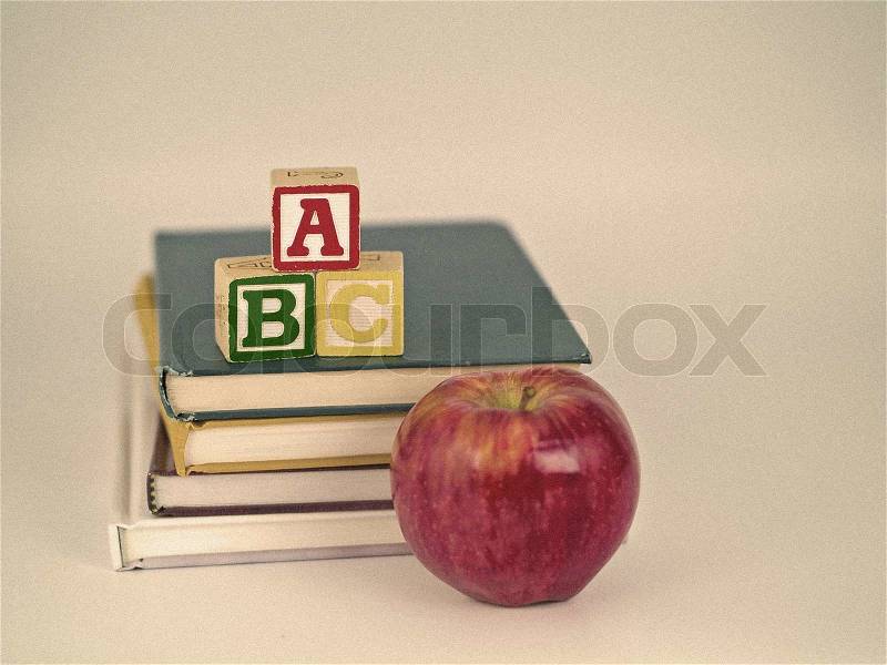 ABC Blocks and Apple on Children\'s Books Sepia Style, stock photo