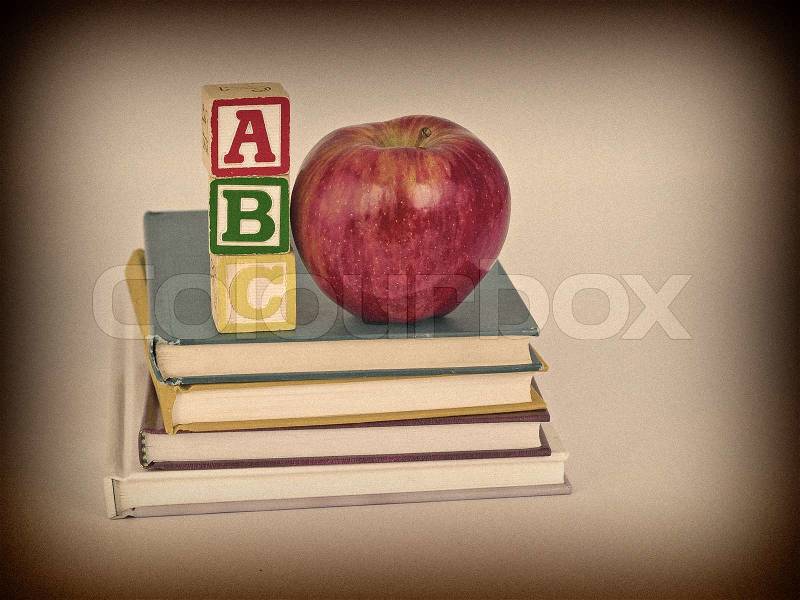 ABC Blocks and Apple on Children\'s Books in a Retro Vintage Style, stock photo