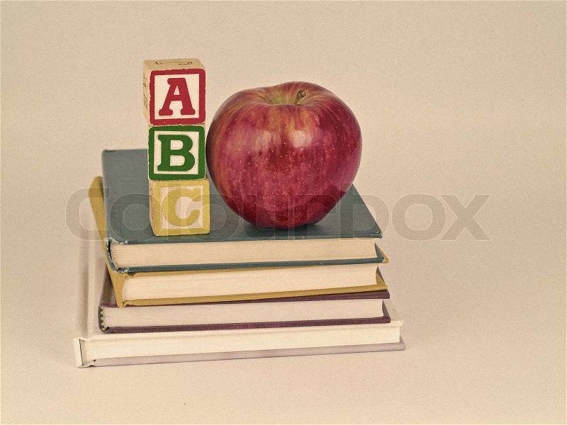 ABC Blocks and Apple on Children\'s Books Sepia Style, stock photo