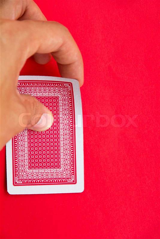Hand Lifts The Card, stock photo