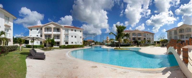 Luxury resort with tropical pool, stock photo