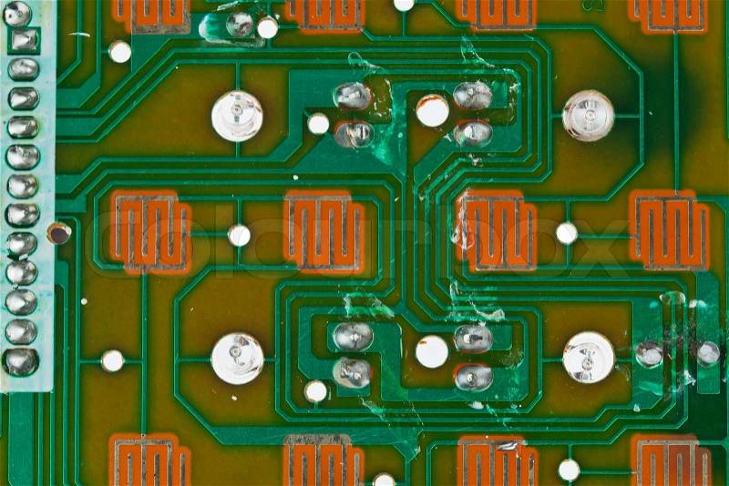 The modern printed-circuit board with electronic components macro background, stock photo