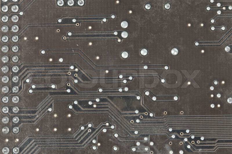 The printed-circuit board with electronic components macro background, stock photo