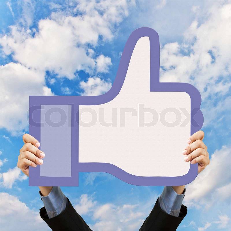 Businessman holding like button sign and hand, stock photo