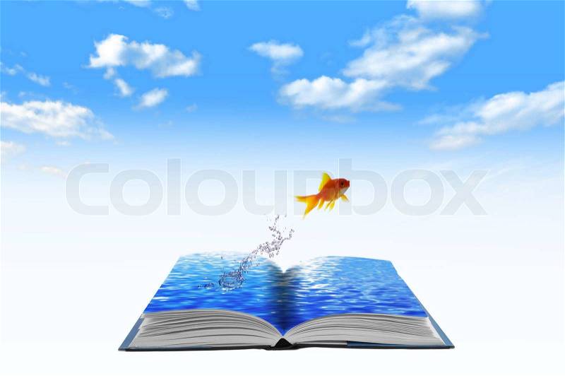 Golden fish jumping across water book, conceptual idea, stock photo