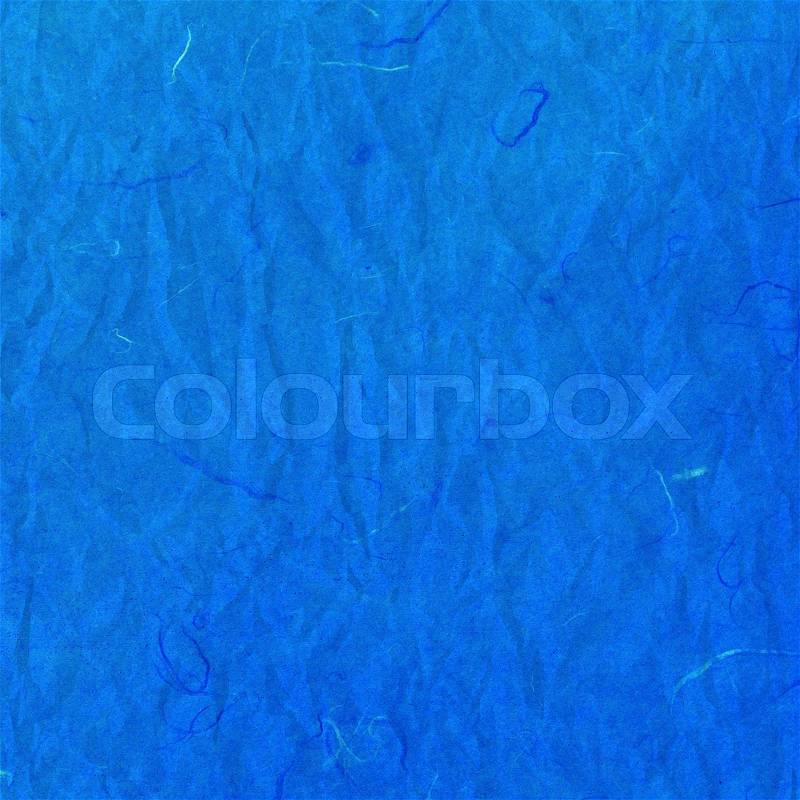 Old blue crumpled rice paper texture, stock photo