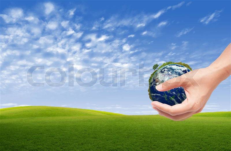 Hand holding sprout with soil,green eco concept, stock photo