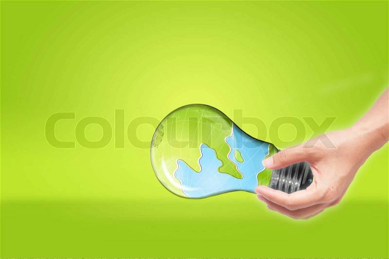 Hand holding Bulb with earth inside isolated on white background , green eco concept, stock photo