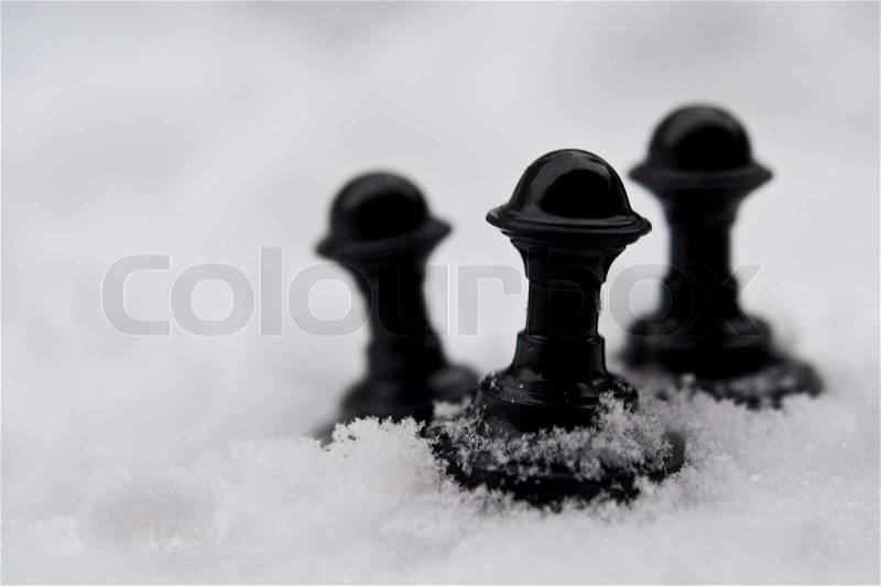 Winter chess pieces, stock photo