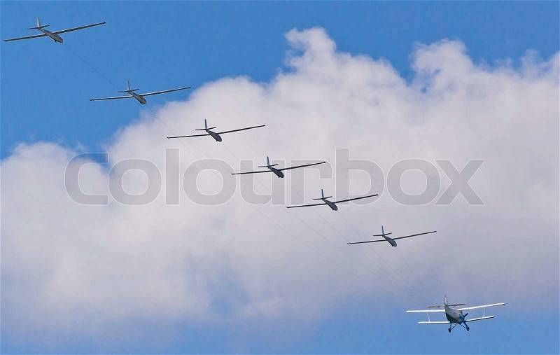 Gliders on a tow at the motor plane, stock photo