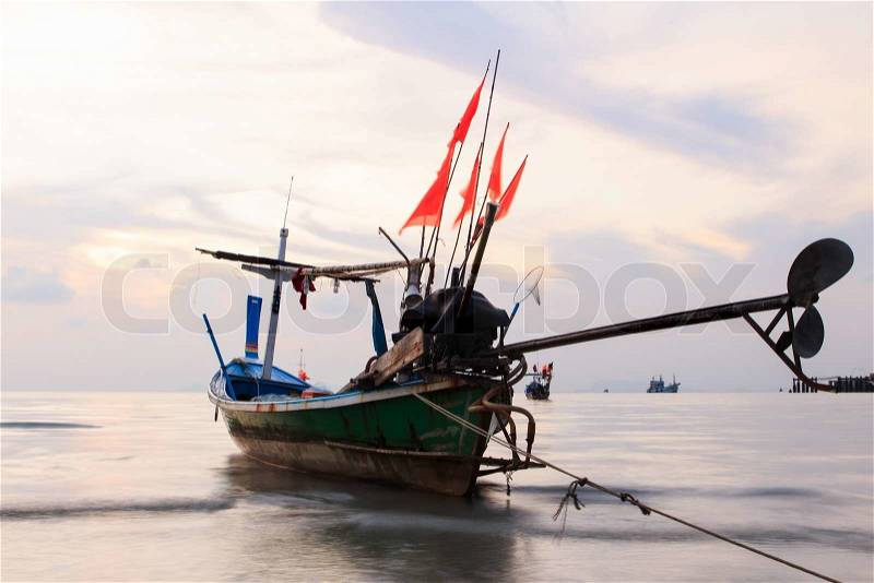 Long tail boat at duskLong exposure technique, stock photo