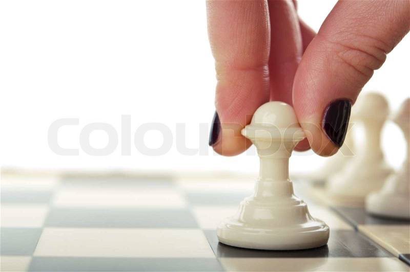 Woman play chess game, stock photo