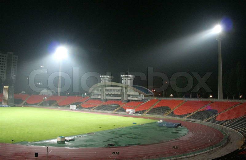 Night football stadium, stock photo
