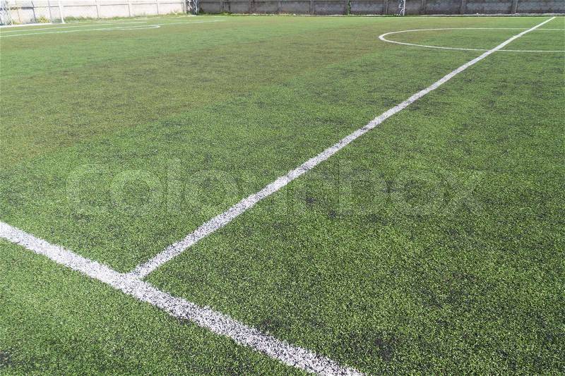 Ceneter line football / soccer pitch with green artificial grass, stock photo