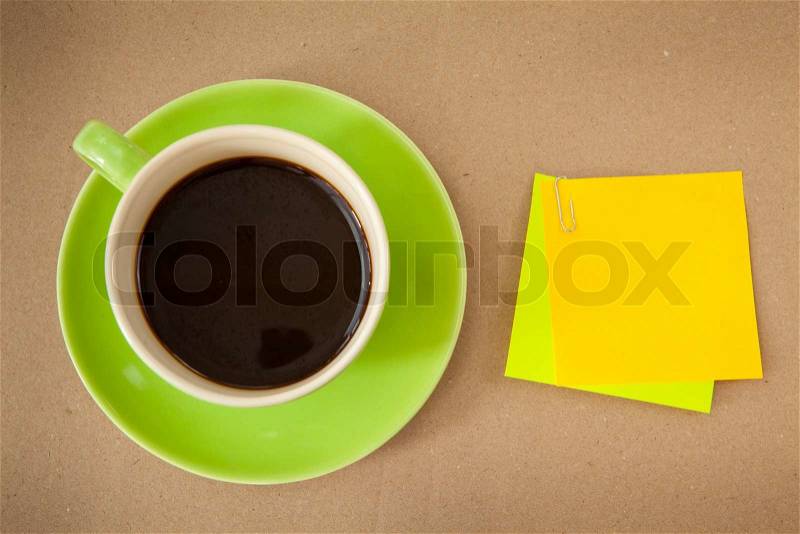 Green cup and note paper, stock photo