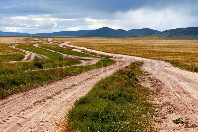 Many desert rural road Mongolia, stock photo