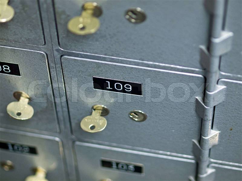 Old Gray and Numbered Safety Deposit Boxes, stock photo
