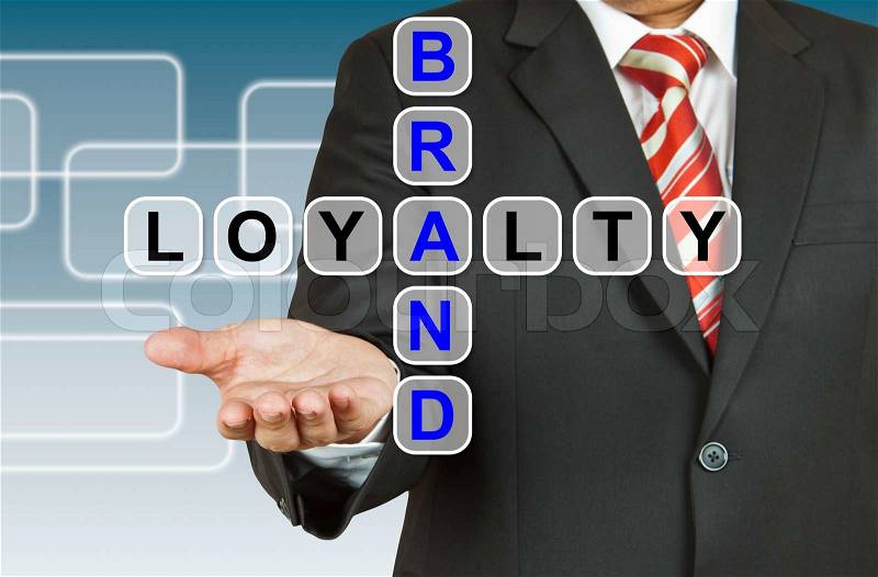 Businessman hand drawing Brand Loyalty, stock photo