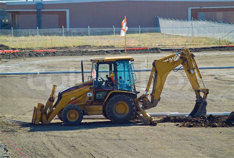 Heavy Duty construction equipment at work site, stock photo