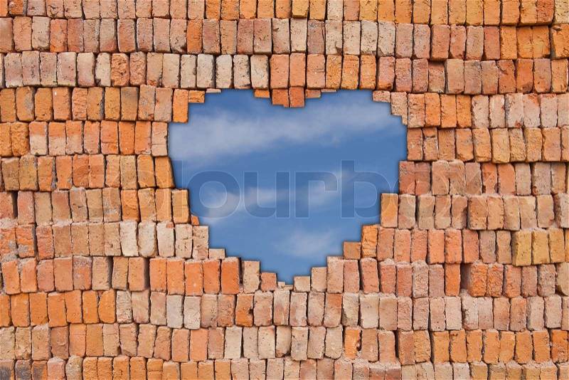 Heart on brick wall, stock photo