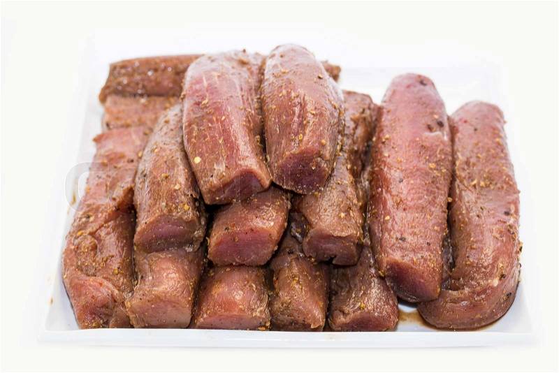 Raw meat and spices for cooking on the grill, stock photo