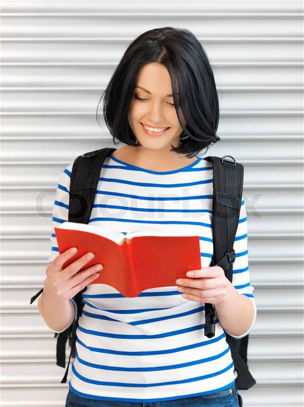 Woman with bag and book, stock photo