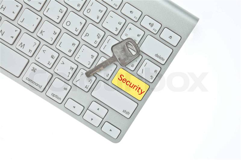 Key and security button on computer keyboard isolated on white background, stock photo