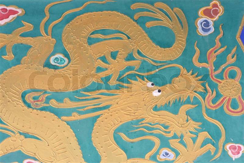 Golden Chinese Dragon on Green Background, stock photo