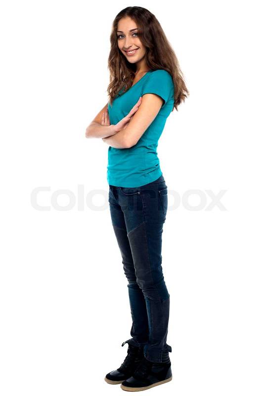 5804048-stylish-woman-standing-sideways-with-arms-crossed.jpg