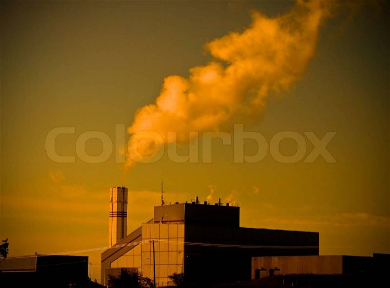 Waste to Energy Plant with Smoke Coming Out of a Smokestack, stock photo