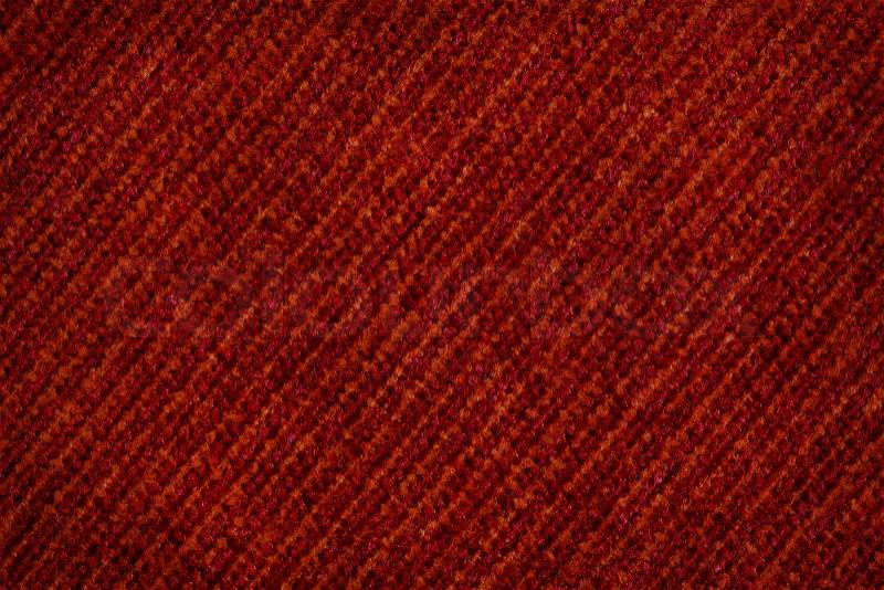 Close up of dark red colored wool textile in Hi-Res, stock photo
