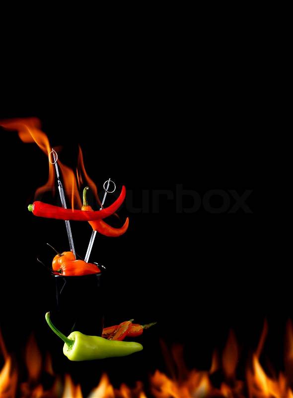 Chili pepper on fire, stock photo