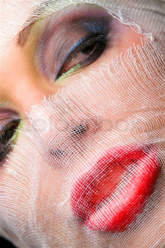 The woman\'s face with beautiful green eyes, stock photo