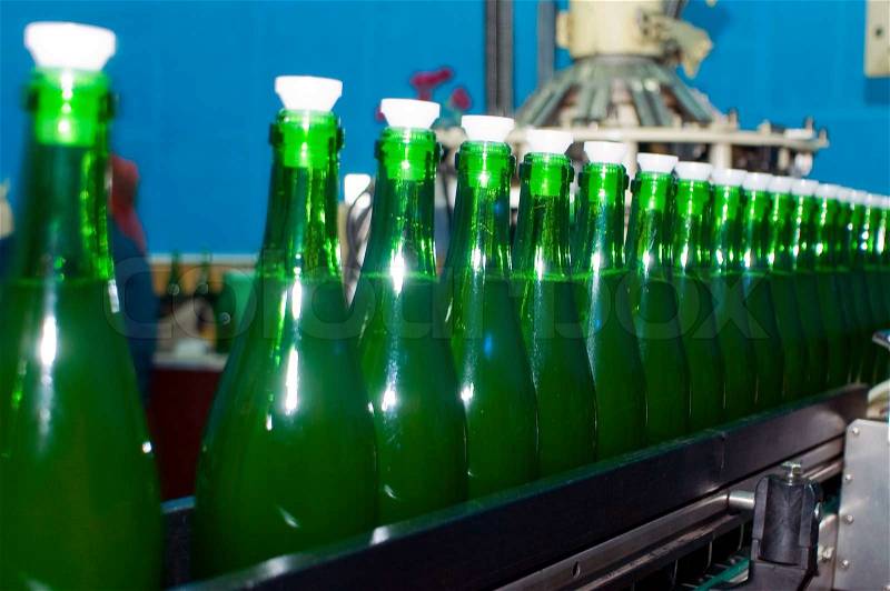 Conveyor with the bottles, stock photo