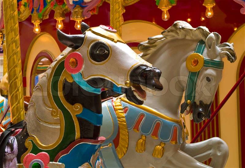 Carousel Horses in a Merry Go Round, stock photo