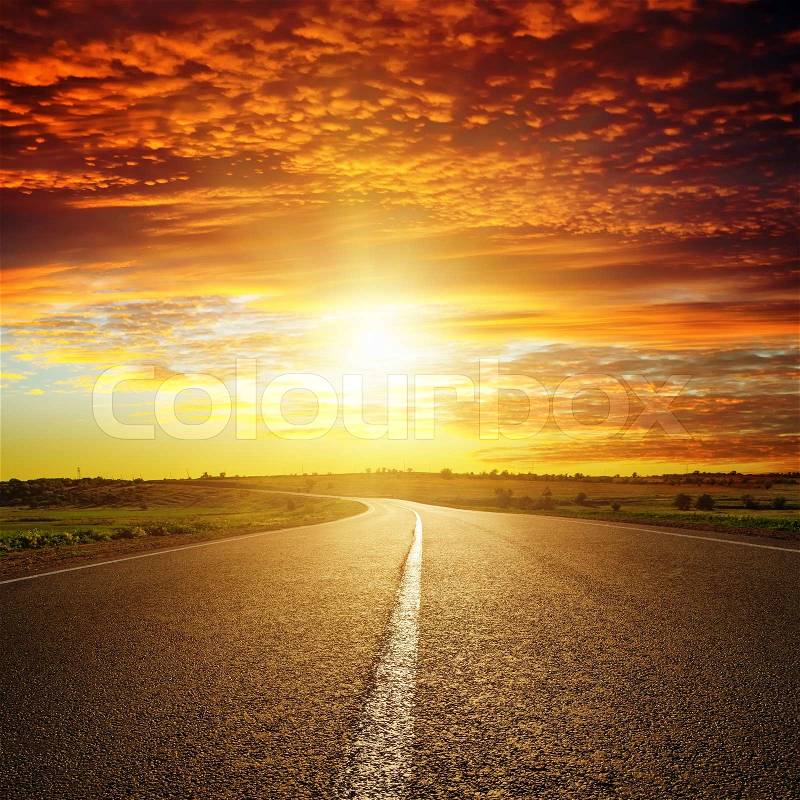 Red sunset over road, stock photo