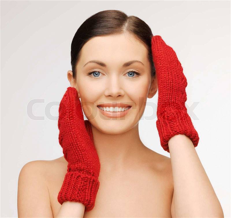 Woman in mittens, stock photo