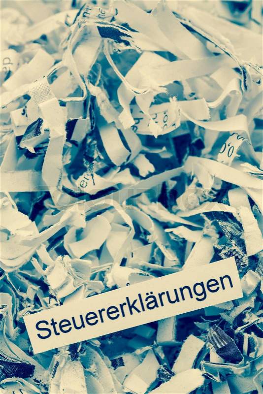 Shredded paper tax returns, stock photo