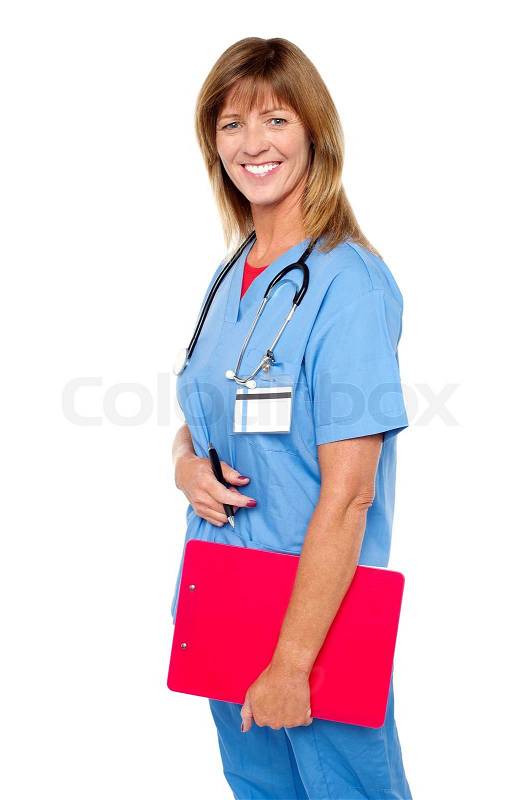 Smiling medical nurse with clipboard, stock photo
