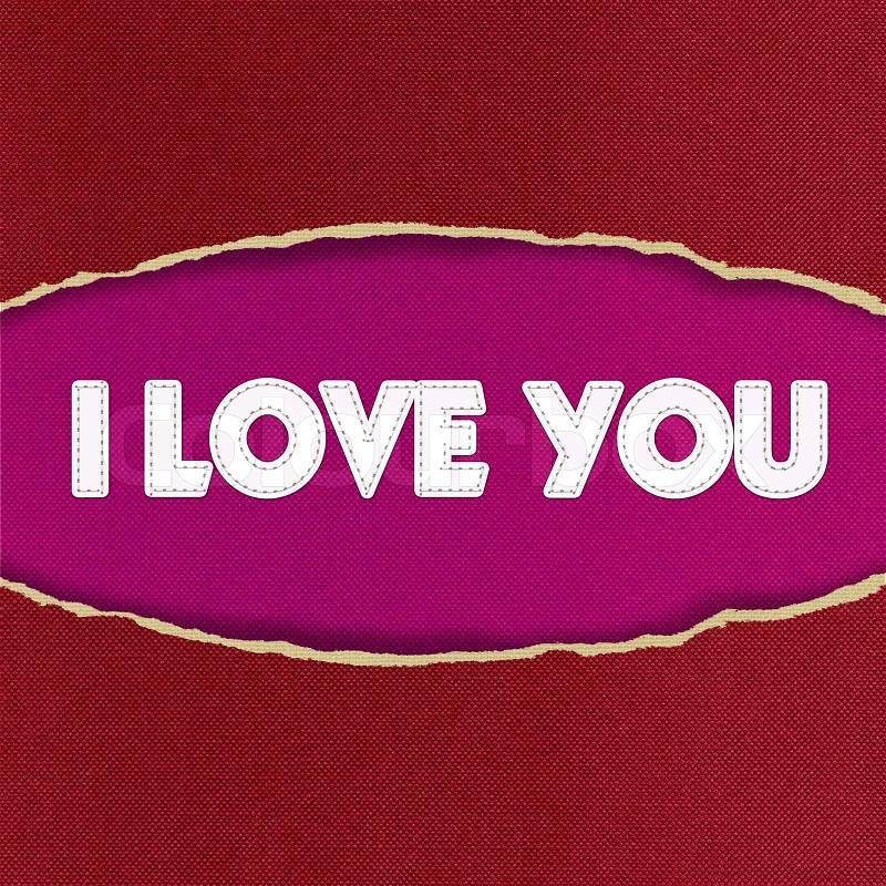 I love you inside Oval Hole ripped in fabric background, stock photo