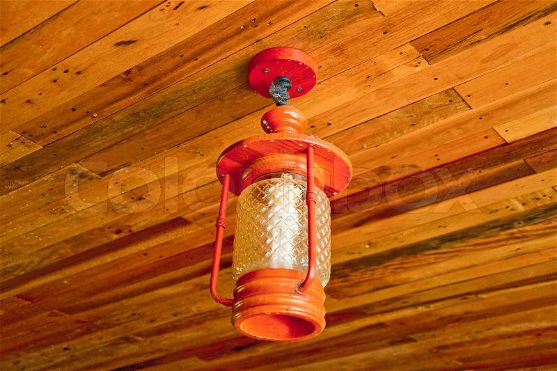 The Modern lamp on wooden ceiling, stock photo