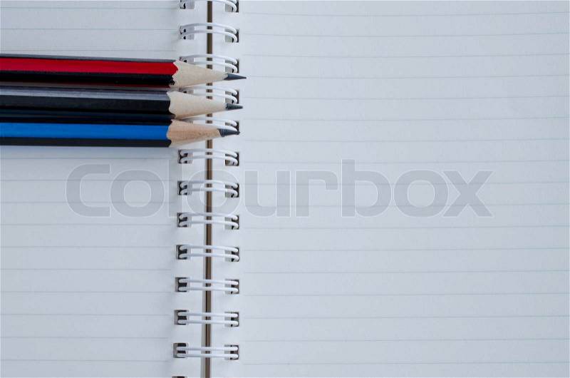 Blank notebook and pencil office stationary, stock photo