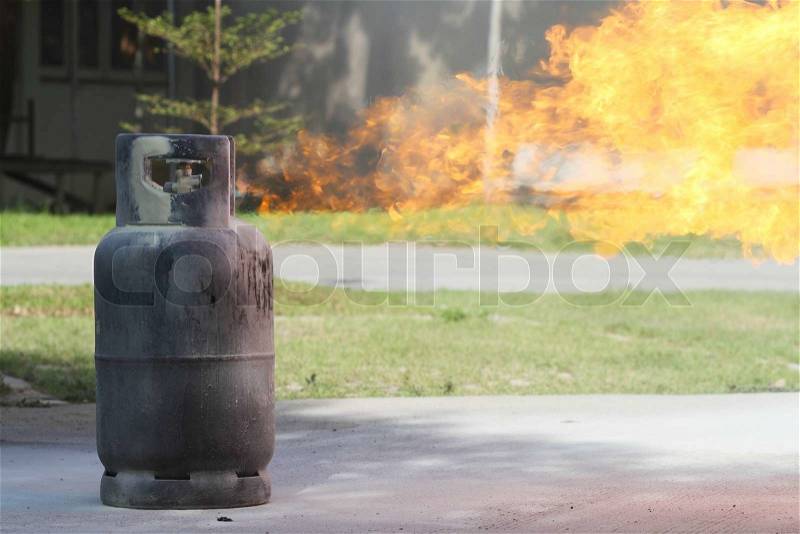Gas container on fire, stock photo