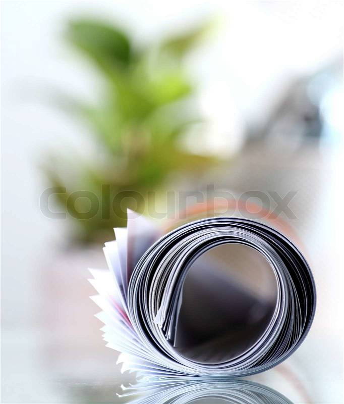Roll of newspaper, stock photo