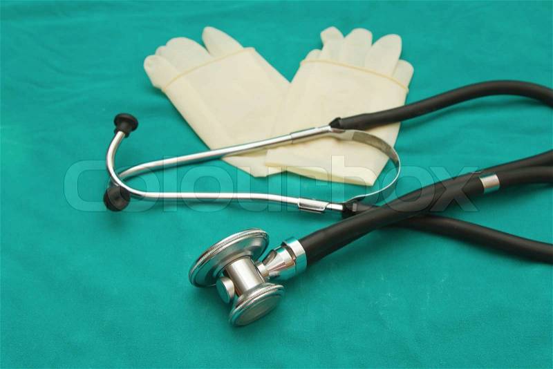 Stethoscope and gloves for examination, stock photo