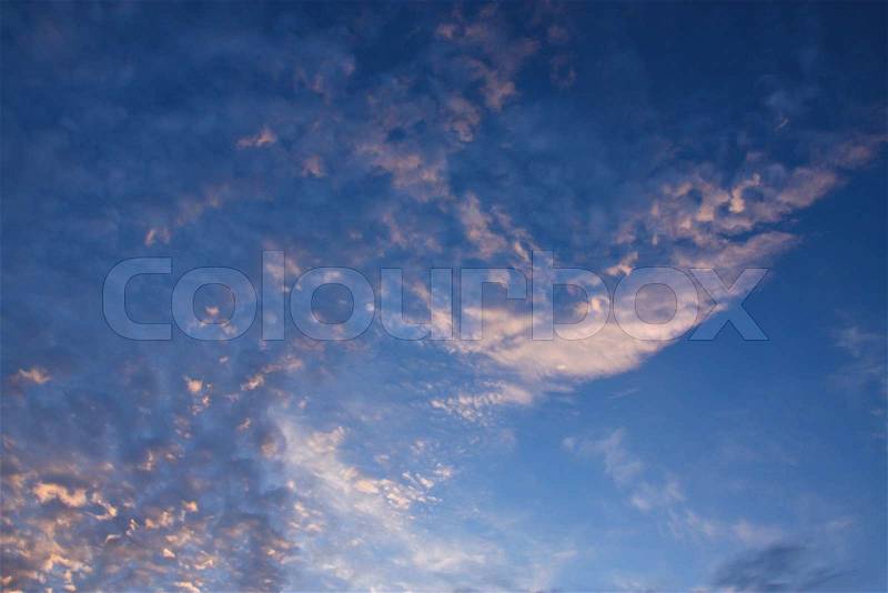 Amazing cloud with golden light and blue sky, stock photo